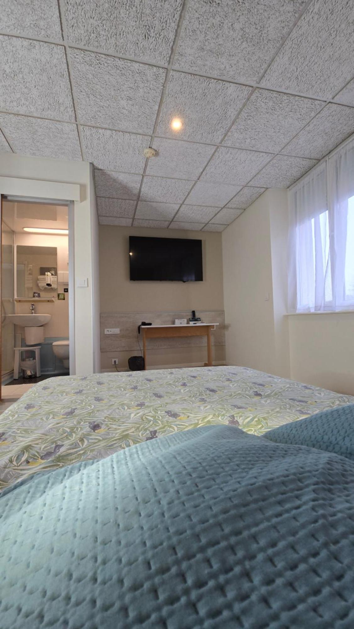 Logis Hotel & Restaurant Arcombelle 몽티그니레로아 외부 사진