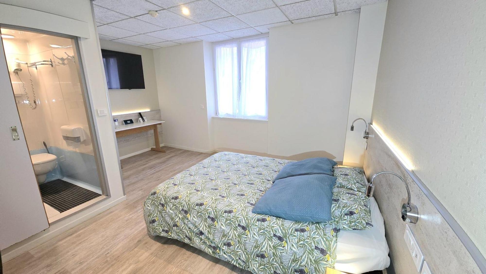 Logis Hotel & Restaurant Arcombelle 몽티그니레로아 외부 사진