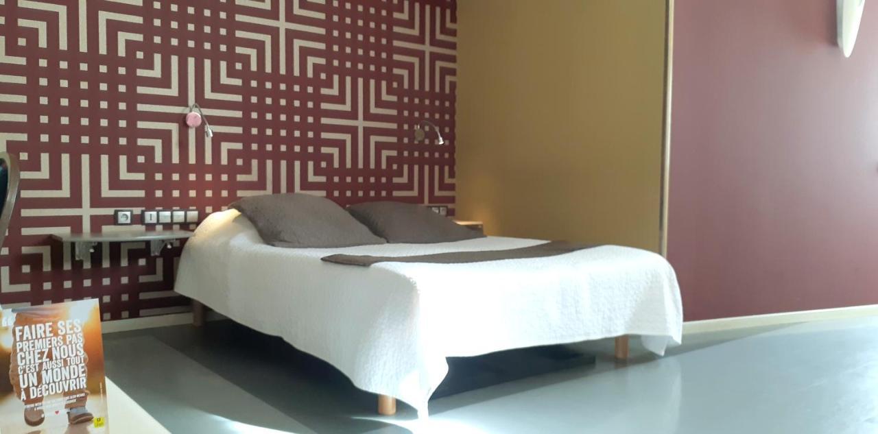 Logis Hotel & Restaurant Arcombelle 몽티그니레로아 외부 사진