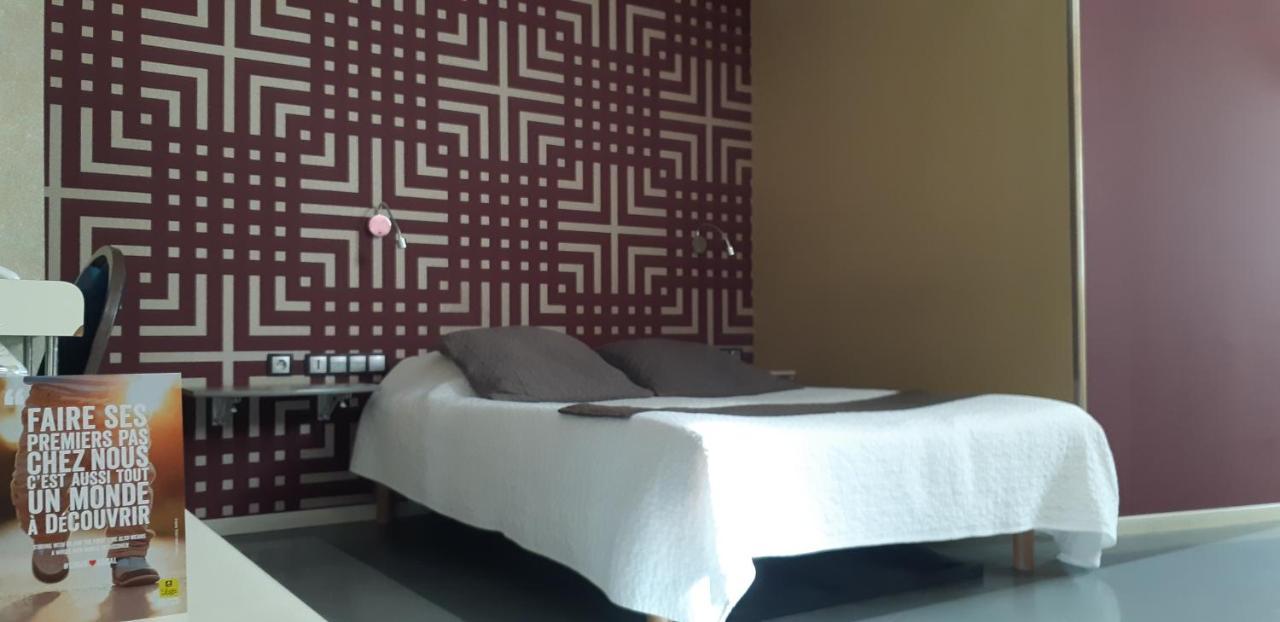 Logis Hotel & Restaurant Arcombelle 몽티그니레로아 외부 사진
